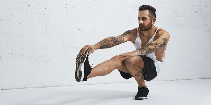 Man performing a pistol squat