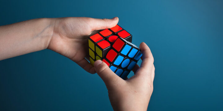 Man solving Rubik's cube