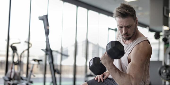 Man having a better workout pump with the help of L-Arginine